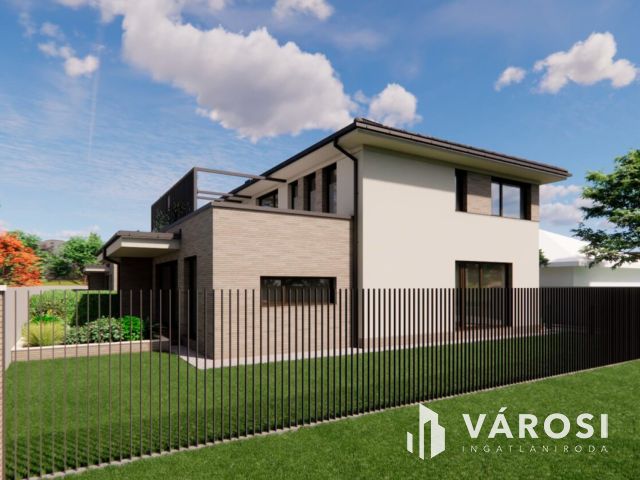 Debrecen csendes kertvárosi részén ELADÓ IKERHÁZ